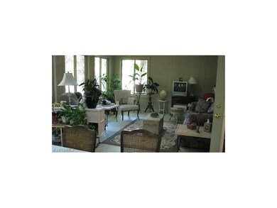 Additional entertaining space in the very large attached three season room.