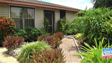 Lushly landscaped home.