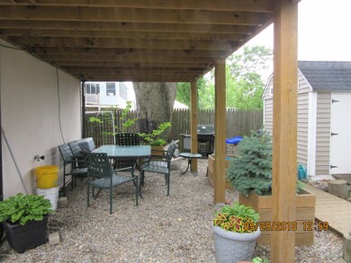 Stoned eating area below the deck