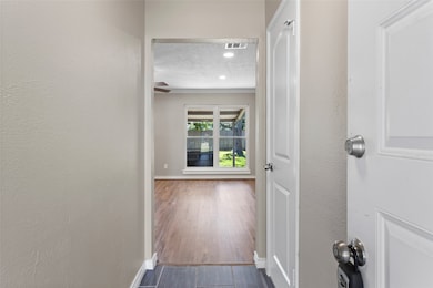 Tiled entry that opens to the family room