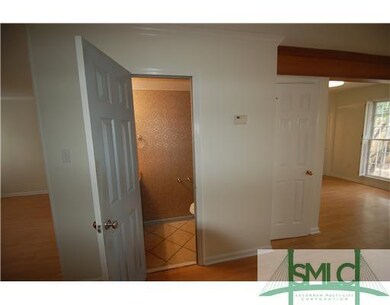Other. Powder Room with textured wall paper, newer
