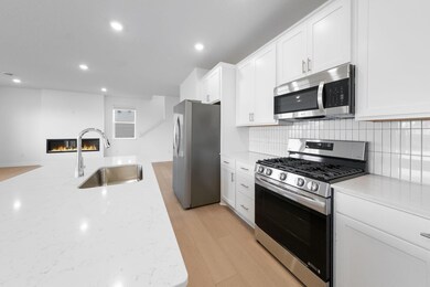 (Photo of a very similar home, actual finishes may vary)