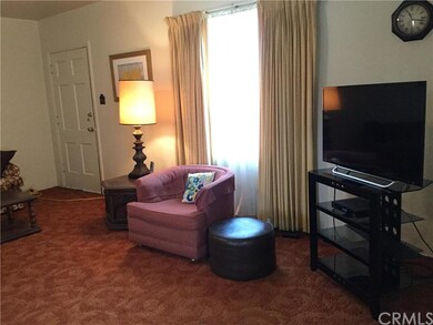 Step into the spacious, oversized living room of t