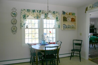 Table and chairs for kitchen dining by window with