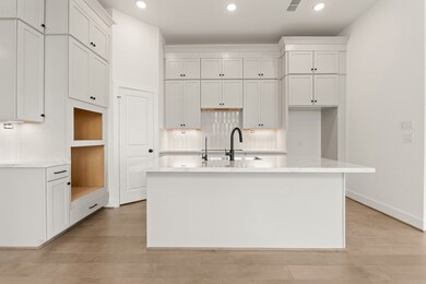 *REPRESENTATIONAL PHOTO* Stacked Cabinets in the Kitchen Masterpiece