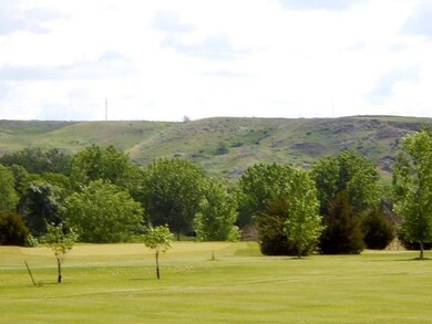 Overlook the beautiful Dunes Golf Course
