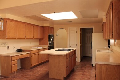 Kitchen showing desk area & Island