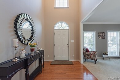Foyer opens to Formal Loving and Dining Rooms