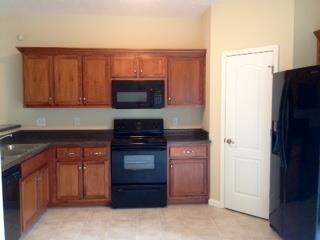 Kitchen has large pantry