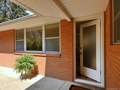 Wide overhangs - front porch sitting area.