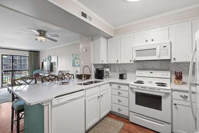Kitchen featuring white appliances, sink, kitchen 