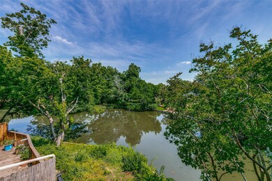 Peaceful lake views can be enjoyed from the living