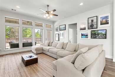 A wall of windows showcase the beautiful outdoors.