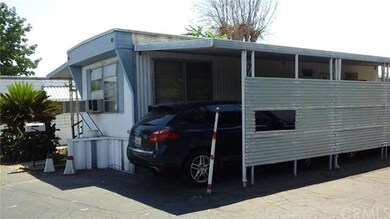 Side view with attached covered carport for 2 vehi