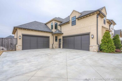 Two 2-Car Garages feature electric OH doors and 2