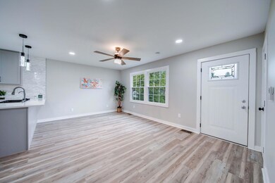 Open and Bright Living/Dining Area!
