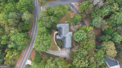 Located on 1.33 acres, the house is sitting on a very gentle knoll overlooking the surroundings.