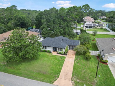 Aerial Picture boasting new roof and mature magnolia tree in front yard.