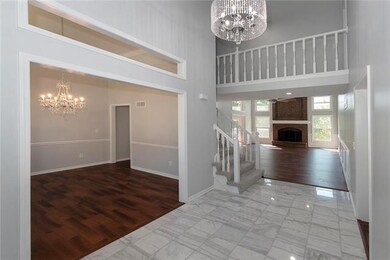 Marble floor in beautiful entryway. Formal dining 