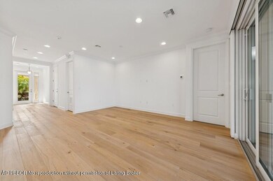 07_11610SWHawkinsTer_148_FoyerLivingRoom