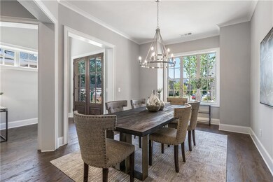 Dining area featuring french doors, dark wood-type
