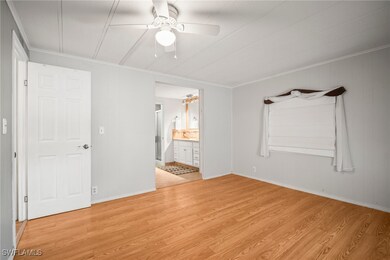 Unfurnished bedroom featuring light wood-type floo
