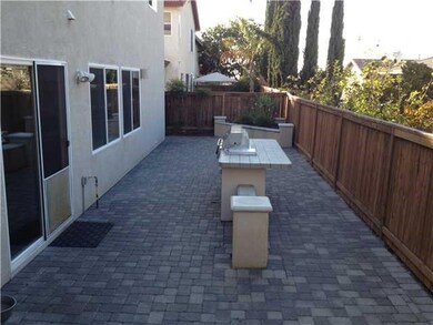 Have fun with the outdoor cooking using this built in BBQ in your beautifully landscaped back yard.  Pavers thourghout for low maintenance.