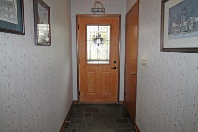 Foyer with slate flooring