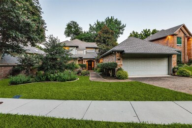 Beautifully landscaped front yard. Oversized two c