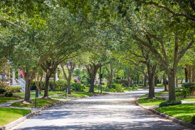 LOCATED ON A BEAUTIFUL SHADY STREET