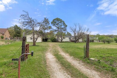 View of street featuring driveway