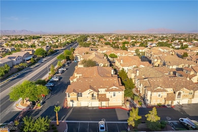 Aerial view of residential area featuring a mounta