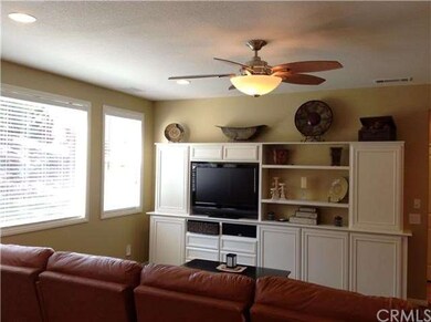 Family room with built in entertainment center.