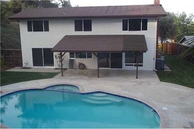 Backyard pool, spa and covered patio