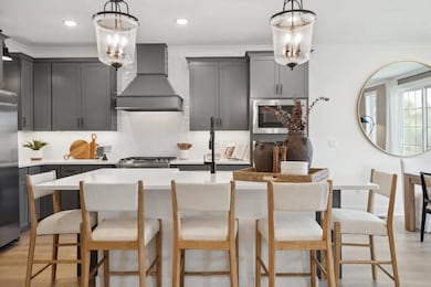 Kitchen with pendant lighting over island