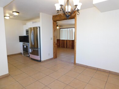 Kitchen opes to dining