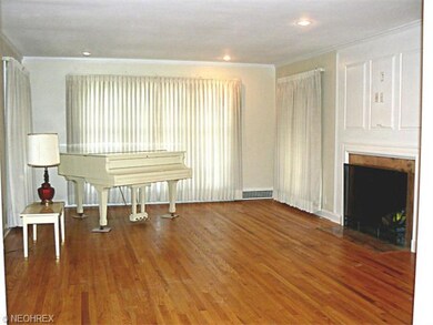 Living Room with Beautiful Hardwood Floors & Woodb