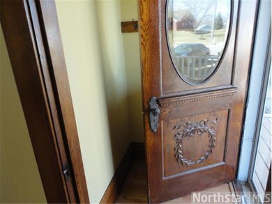 Solid oak front glassed door reveals handsome mill