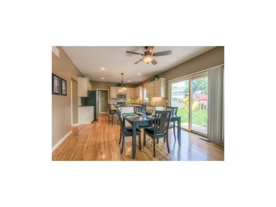 This view of the kitchen is from the family room. 
