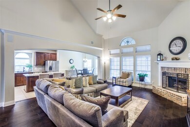 Vaulted ceiling in living room with gas/wood burning fireplace