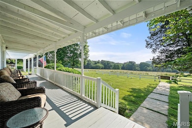 Wooden deck featuring a view of rural / pastoral area
