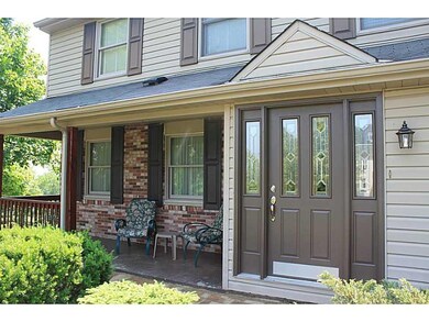 Exterior Front. Relax on the covered front porch o