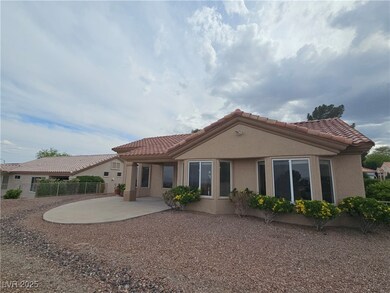 Back of property is fully fenced with a patio, a t