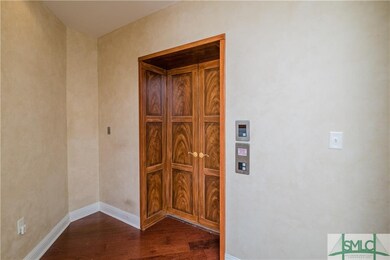 The entry foyer for the condo has a painted trompe