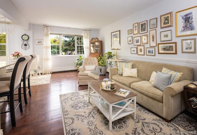 Living Room w/ hardwood floors and picture window