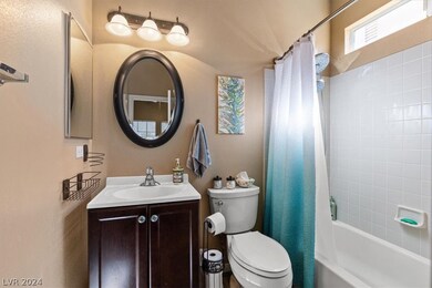 Private 3rd full bath with updated vanity & mirror
