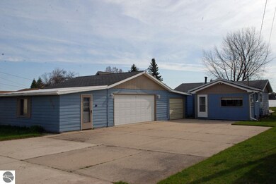 Concrete drive way with lots of room for a basket 