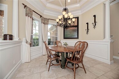 Octagonal Dining Room with Tray ceiling and decora