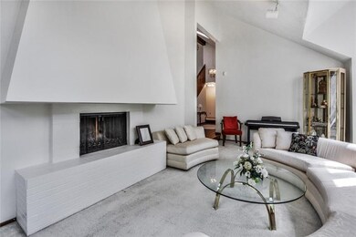The gas log fireplace is showcased in this lovely 