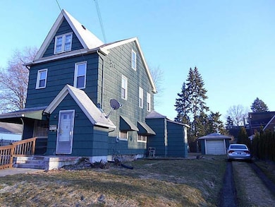 Exterior Front. Side with garage